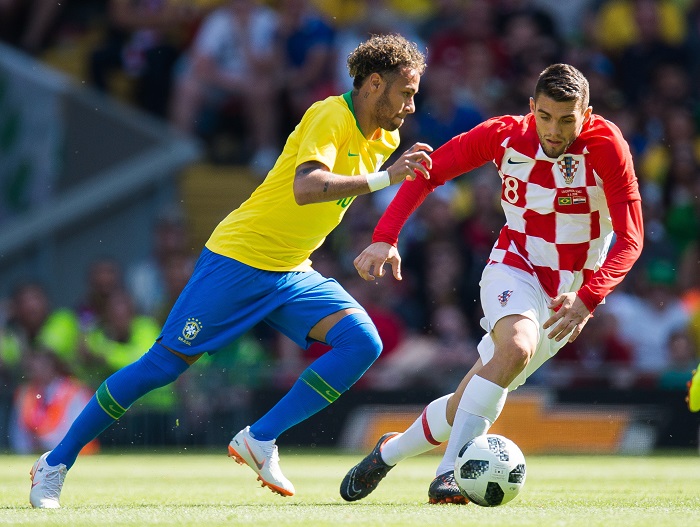 Brazil’s Neymar in action with Croatia's Mateo Kovacic.