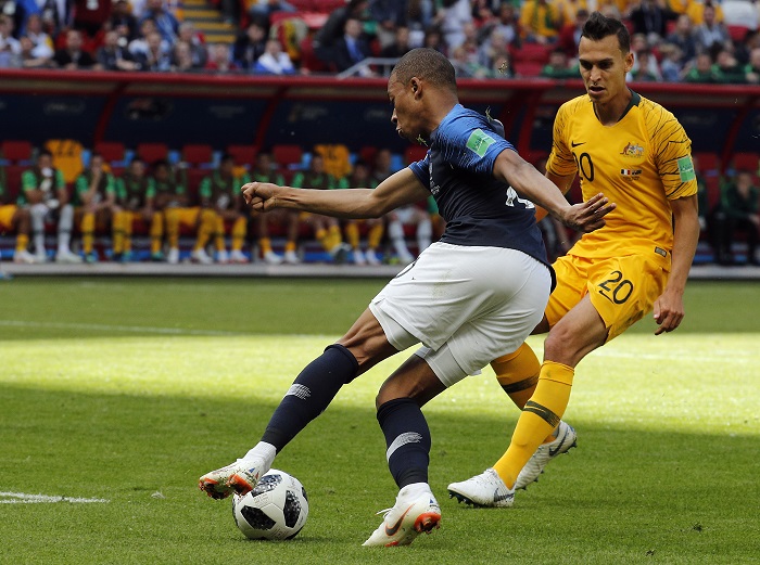 Trent Sainsbury of Australia and Kylian Mbappe of France in action.