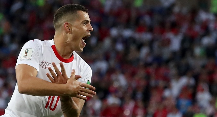 Granit Xhaka of Switzerland celebrates scoring against Serbia.