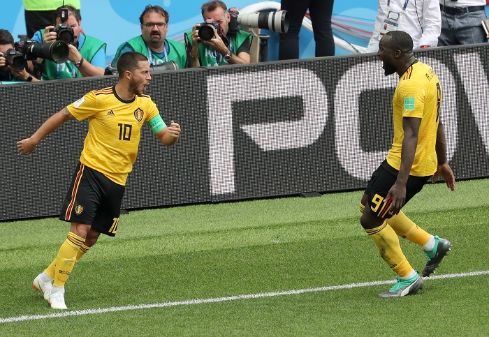 Eden Hazard of Belgium celebrates with team mate Romelu Lukaku after scoring his side's fourth against Tunisia.