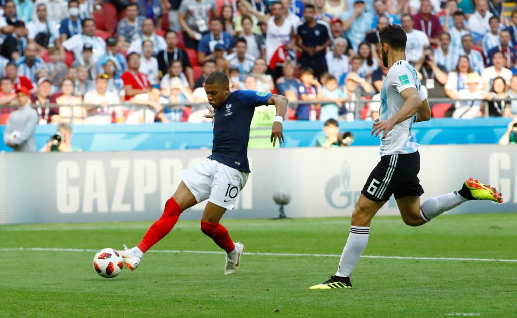 Kylian Mbappe slots home his second against Argentina