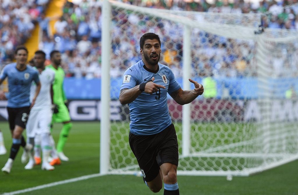 Luis Suarez celebrates his winning goal against Saudi Arabia