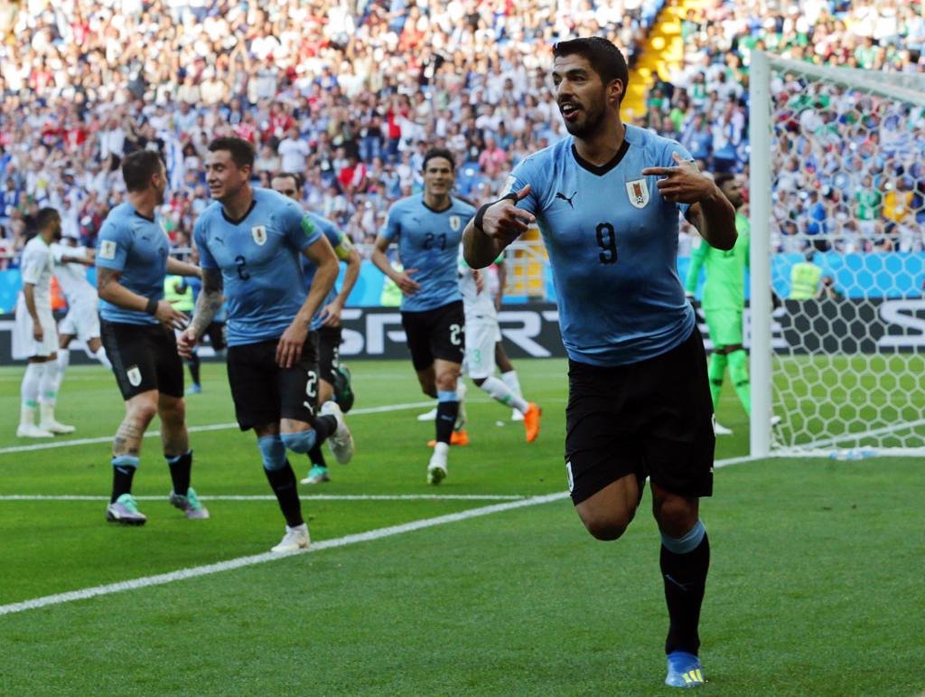 Luis Suarez celebrates after scoring against Saudi Arabia