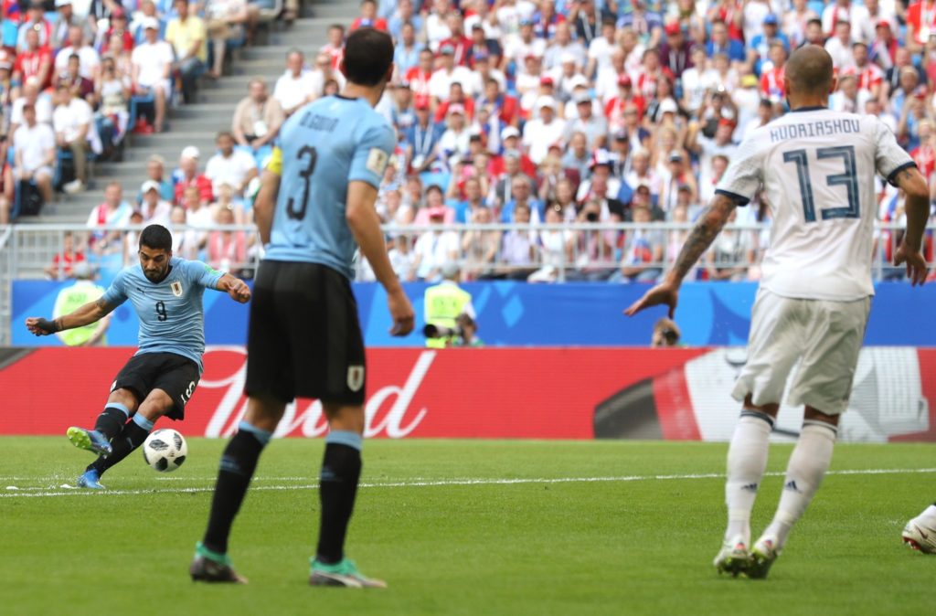 Highlights: Uruguay cruise past Russia to top Group A