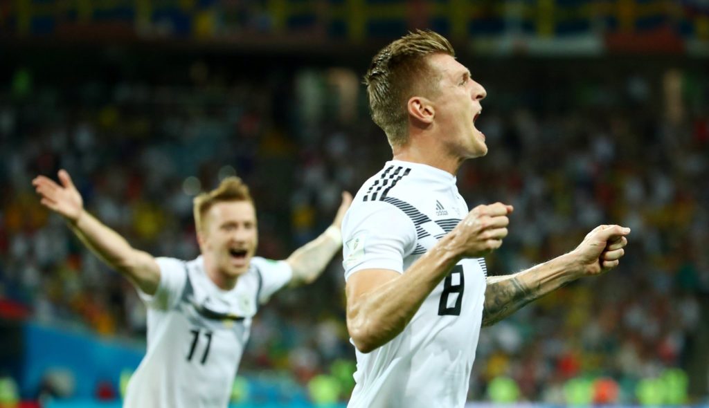 Toni Kroos celebrates his goal against Sweden