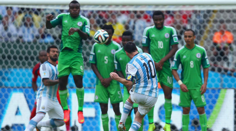 Lionel Messi of Argentina in action against Nigeria at the 2014 Fifa World Cup.