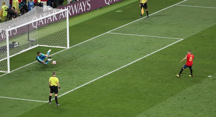 Goalkeeper Igor Akinfeev of Russia saves the penalty of Koke of Spain.