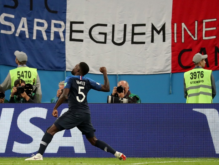 Samuel Umtiti of France celebrates scoring against Belgium.