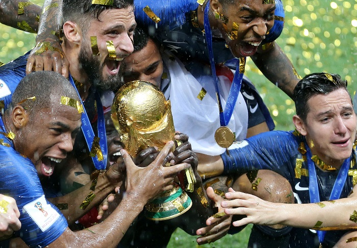 Players of France celebrate with the World Cup trophy.