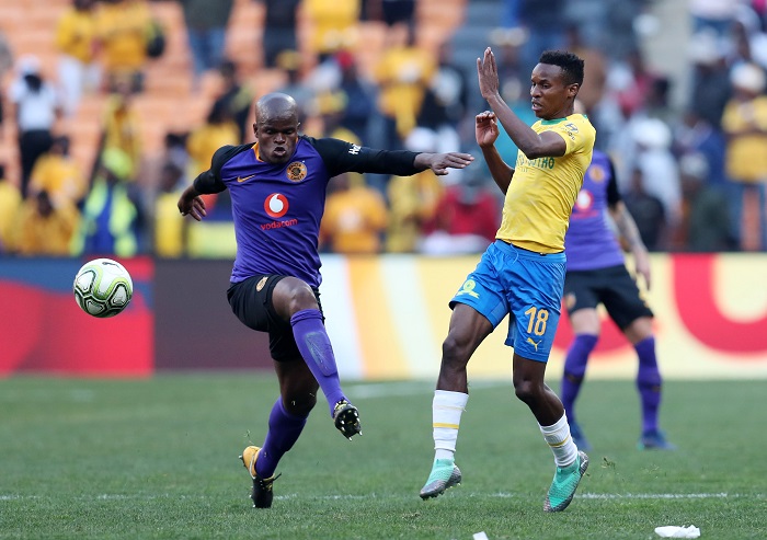 Themba Zwane of Mamelodi Sundowns challenged by Willard Katsande of Kaizer Chiefs