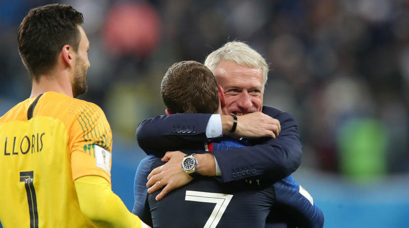 Didier Deschamps celebrates with Antoine Griezmann.