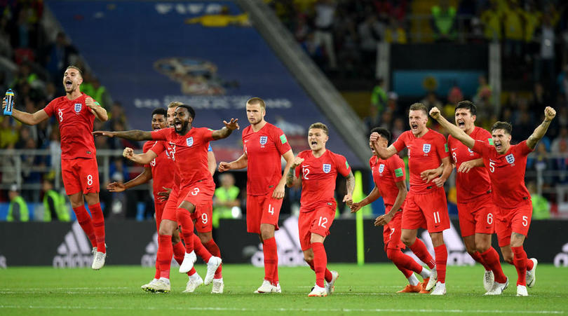 England players celebrating their penalty shoot-out victory over Colombia.