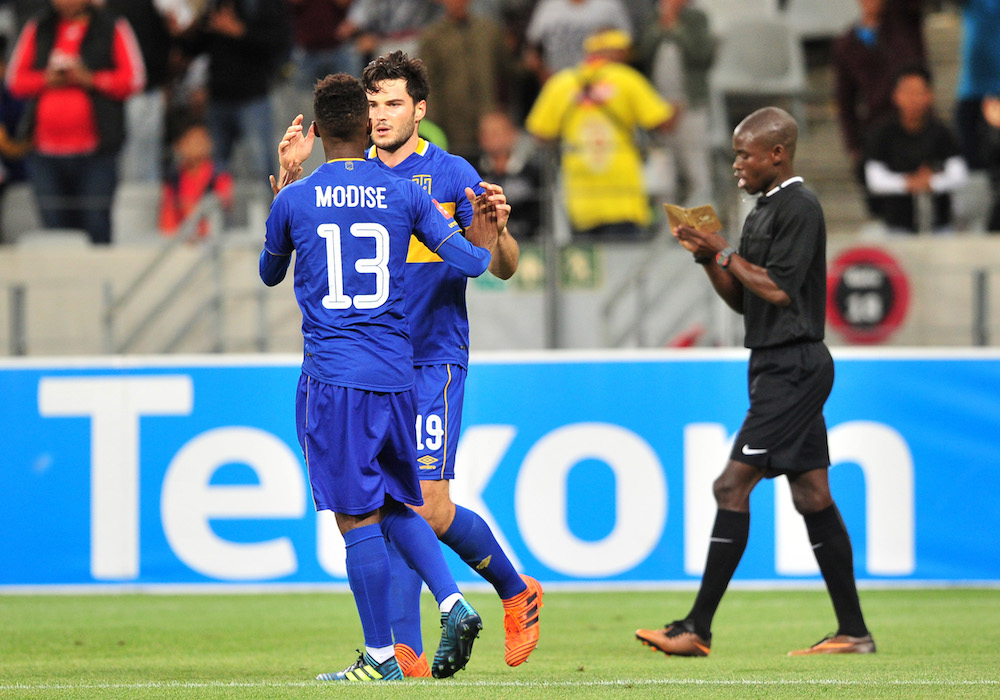 Teko Modise celebrates with goalscorer Roland Putsche