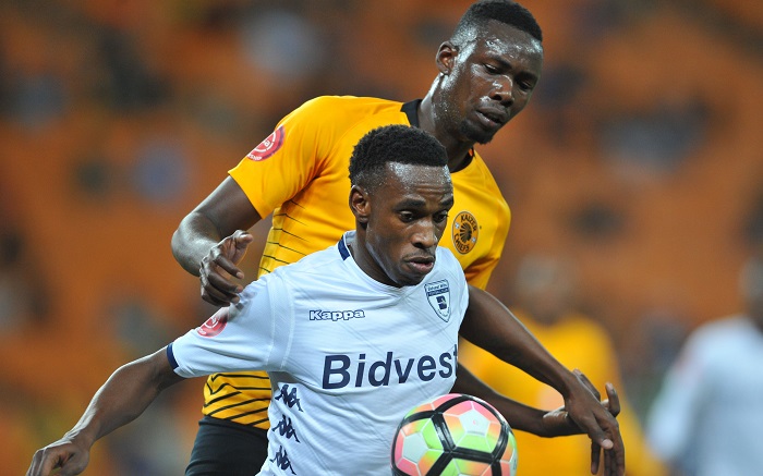 Mxolisi Macuphu of Bidvest Wits challenged by Erick Mathoho of Kaizer Chiefs