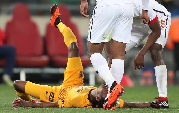 Joseph Molangoane of Kaizer Chiefs reacts in pain after breaking his ankle against Free State Stars.