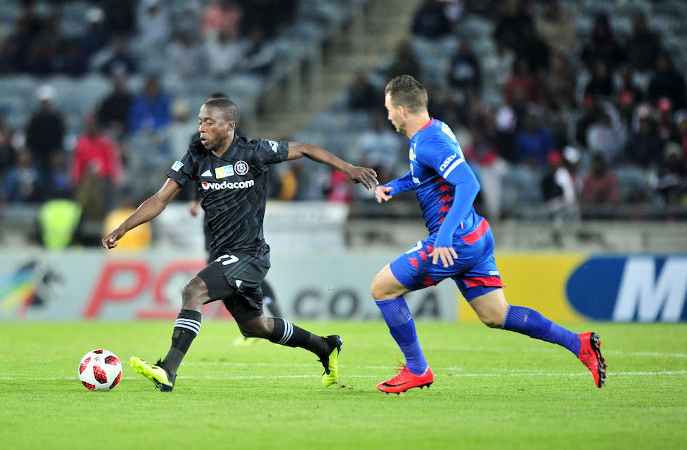 Ben Motshwari challenges Bradley Grobler for the ball