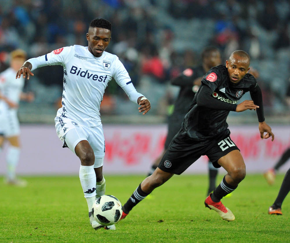 Thabang Monare is challenged by Xola Mlambo