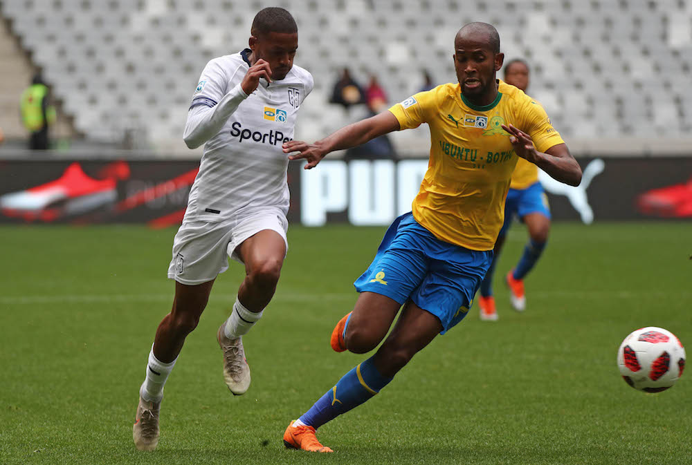 Craig Martin challenged by Mosa Lebusa