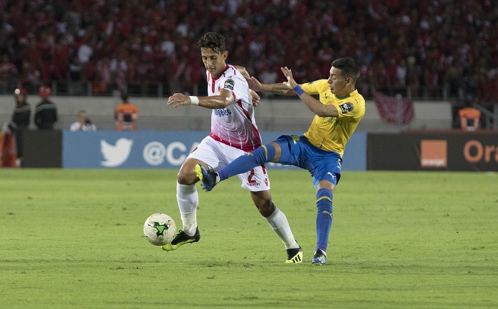 Wydad Athletic Club player Anas El Asbahi and Mamelodi Sundowns forward Gaston Sirino.ahi and Mamelodi Sundowns Gaston Sirino.