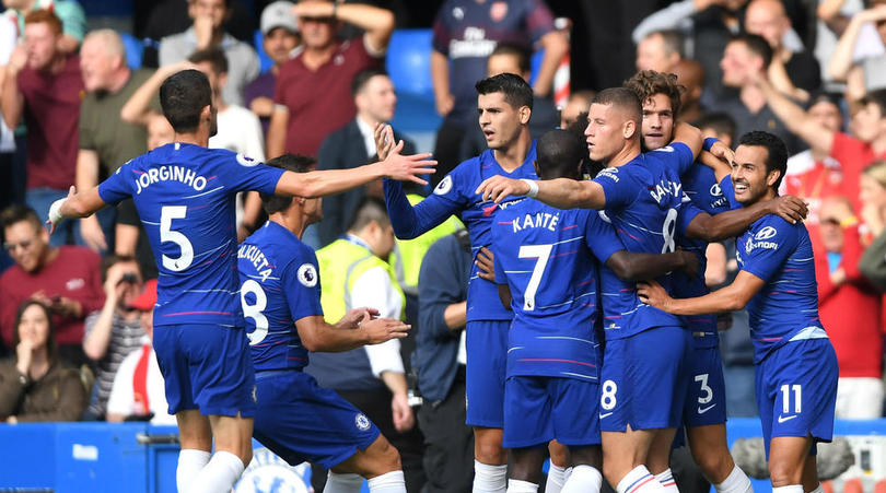 Chelsea celebrate Marcos Alonso's winner against Arsenal.