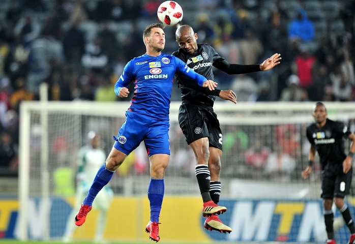 Bradley Grobler of Supersport United challenged by Xola Mlambo of Orlando Pirates