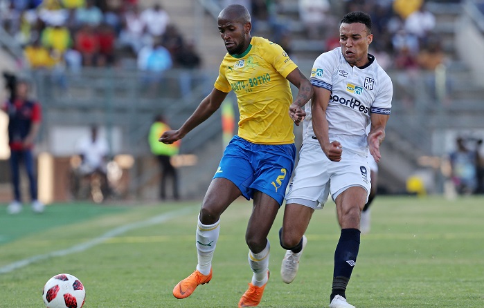 Mosa Lebusa of Mamelodi Sundowns shields Matthew Rusike of Cape Town City