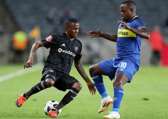 Thembinkosi Lorch of Orlando Pirates challenged by Ayanda Patosi of Cape Town City