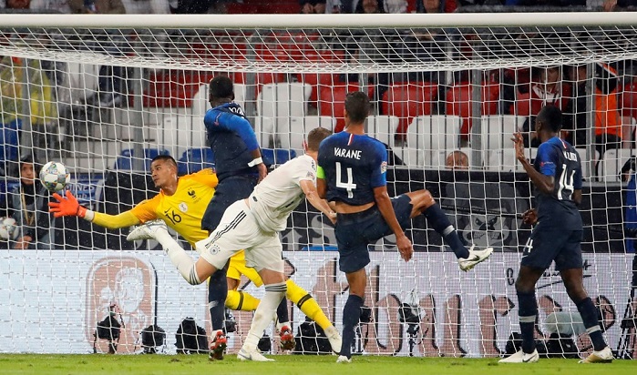 Areola of France saves a header from Matthias Ginter of Germany in their Uefa Nations League opener.