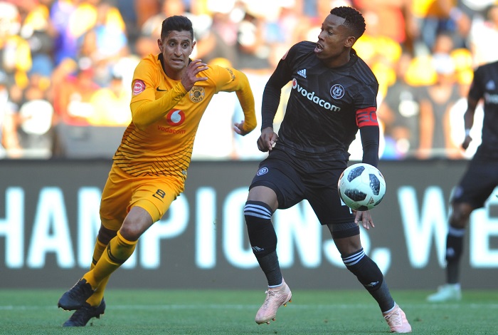 Happy Jele of Orlando Pirates challenged by Leonardo Castro of Kaizer Chiefs