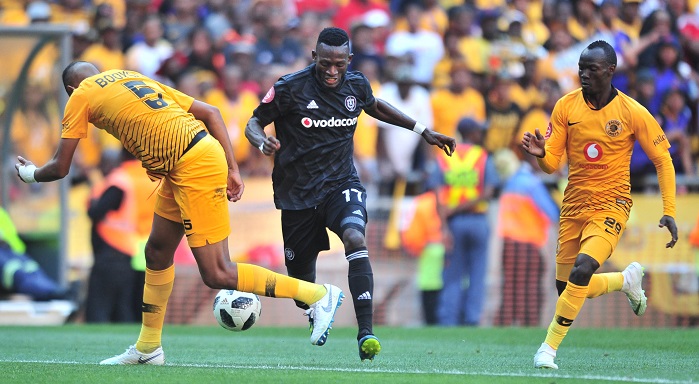 Augustine Mulenga of Orlando Pirates challenged by Mario Booysen of Kaizer Chiefs