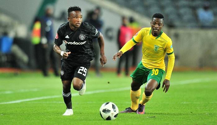 Paseka Mako of Orlando Pirates challenged by Siboniso Conco of Golden Arrows