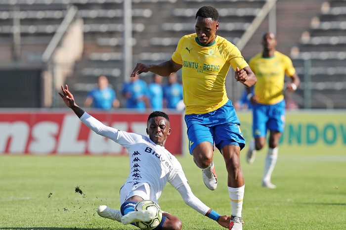 Sibusiso Vilakazi of Mamelodi Sundowns tackled by Thabang Moerane of Bidvest Wits