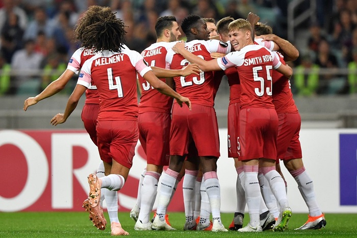 Arsenal celebrate their opening goal