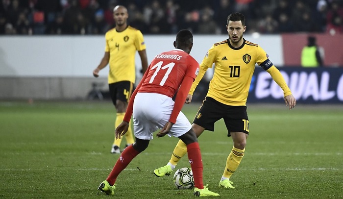 Eden Hazard of Belgium and Edmilson Fernandes of Switzerland