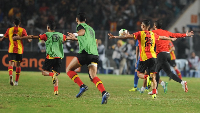 ES Tunis players celebrate winning the Caf Champions League final