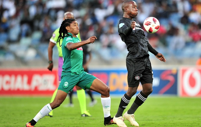 Ben Motshwari of Orlando Pirates challenged by Siyethemba Sithebe of AmaZulu