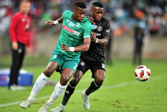 Bongi Ntuli of AmaZulu challenged by Innocent Maela of Orlando Pirates