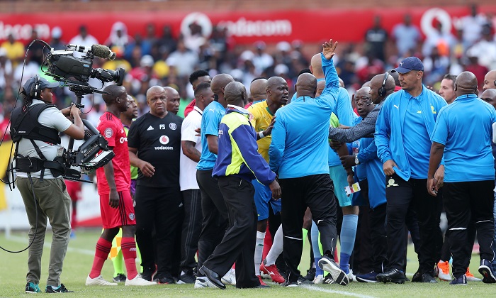 Pitso Mosimane, coach of Mamelodi Sundowns argues with referees and Orlando Pirates technical staff