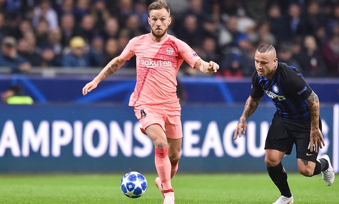 Ivan Rakitic of Barcelona and Radja Nainggolan of Inter Milan