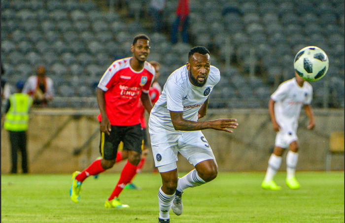 Mpho Makola of Orlando Pirates in action against Light Stars