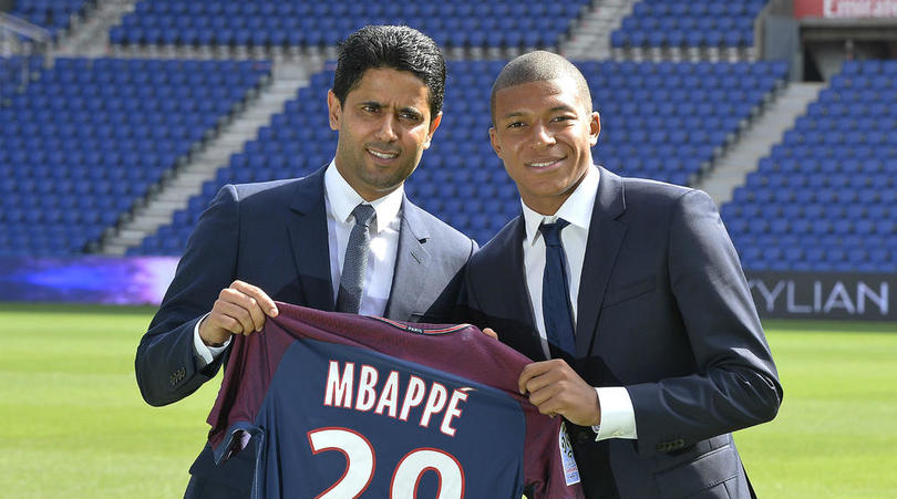 Paris Saint Germain president Nasser Al-Khelaifi and forward Kylian Mbappe.