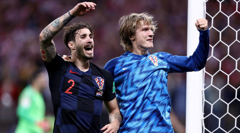 Players of Croatia celebrate at the final whistle