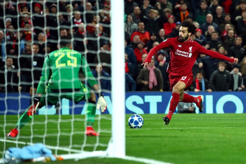 Salah guides Liverpool into UCL last 16