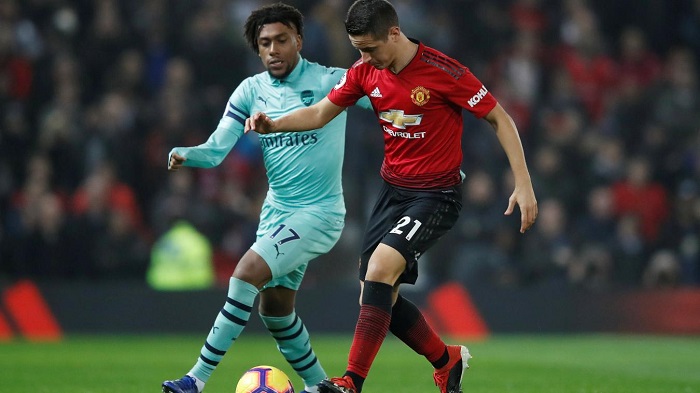 Ander Herrera of Manchester United and Alex Iwobi of Arsenal