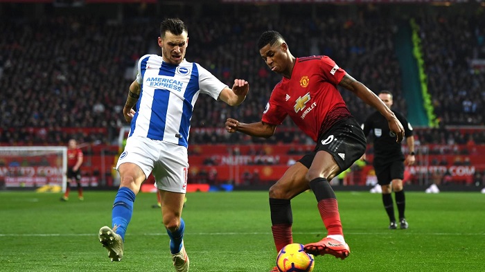 Marcus Rashford of Manchester United and Pascal Gross of Brighton