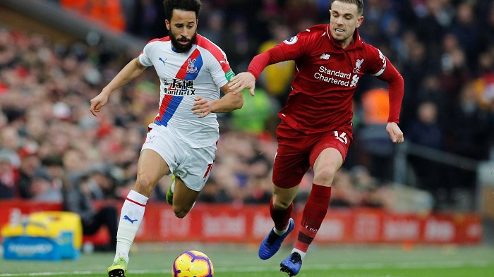 Jordan Henderson of Liverpool and Andros Townsend of Crystal Palace