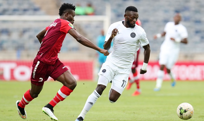 Augustine Mulenga of Orlando Pirates challenged by Hudu Yakubu of Horoya