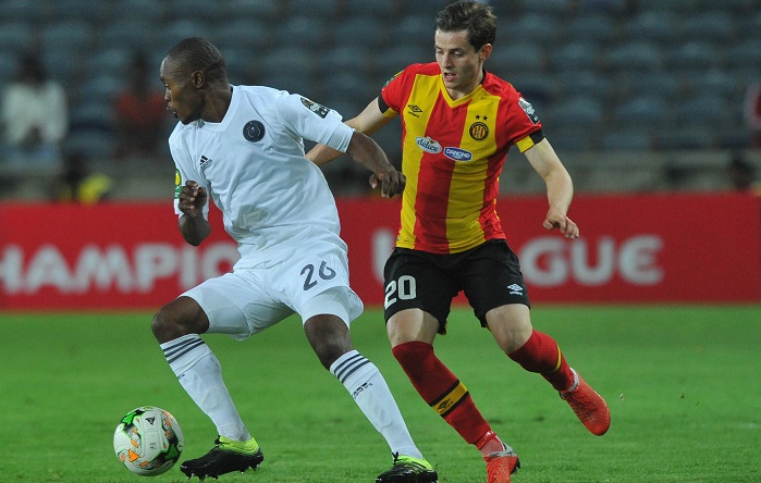 Ayman Ben Mohamed of Esperance challenged by Asavela Mbekile of Orlando Pirates