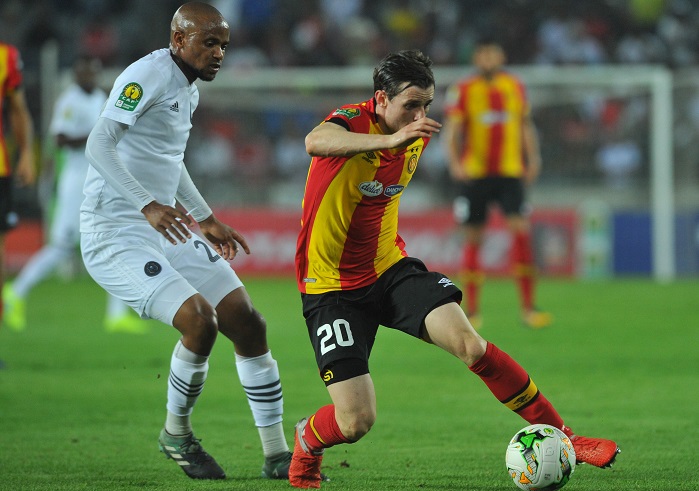 Ayman Ben Mohamed of Esperance challenged by Xola Mlambo of Orlando Pirates