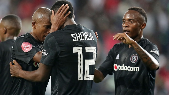 Luvuyo Memela of Orlando Pirates celebrates his goal with teammates